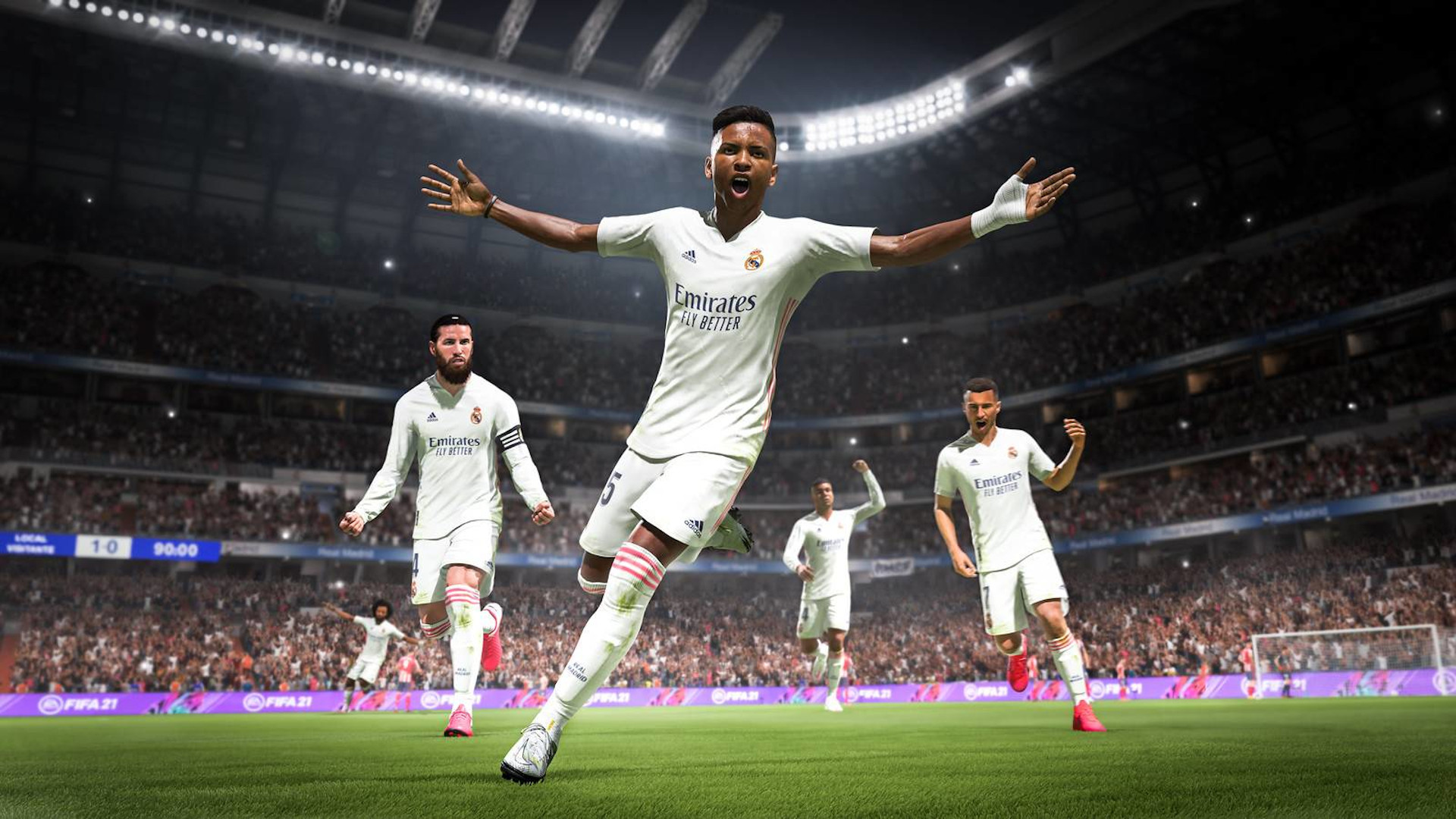 FIFA 22 Career Mode: Four Real Madrid players cheer after scoring a goal.