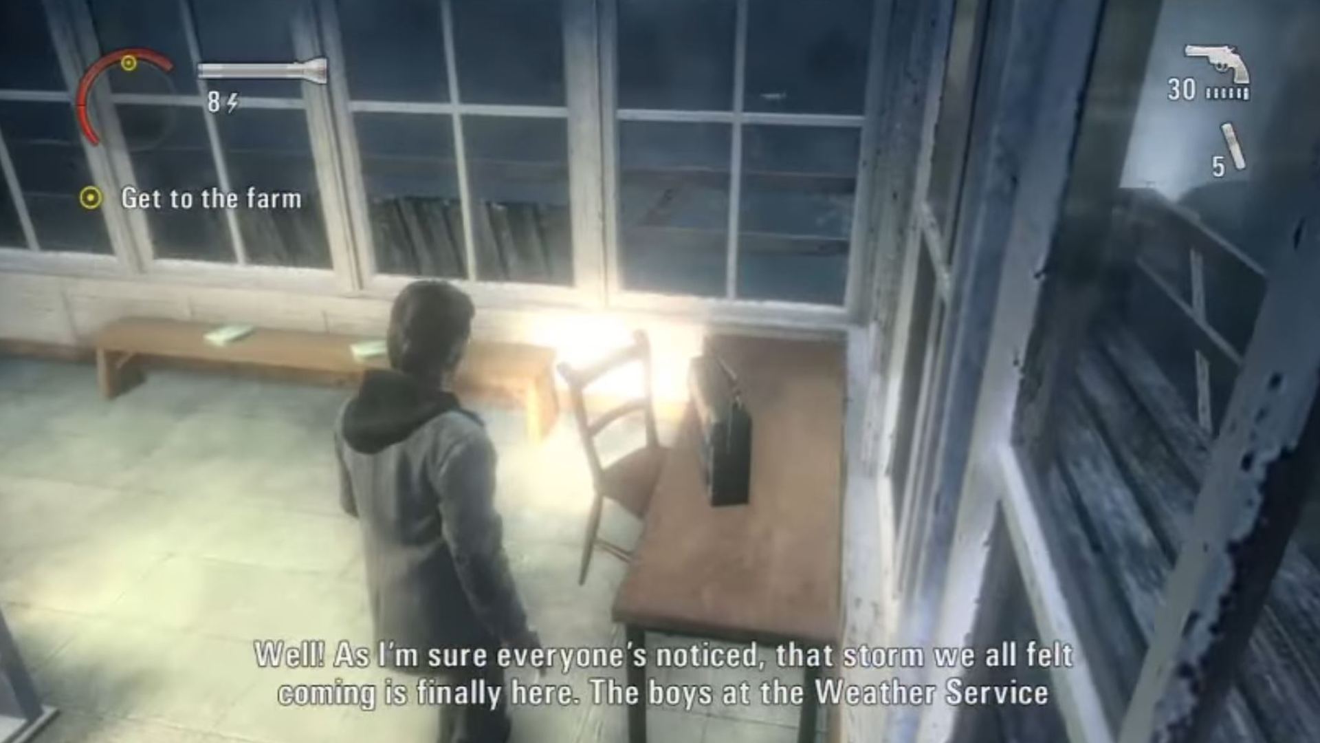 Alan Wake Remastered radios: Alan is looking at the radio sat on the table in the watchtower.