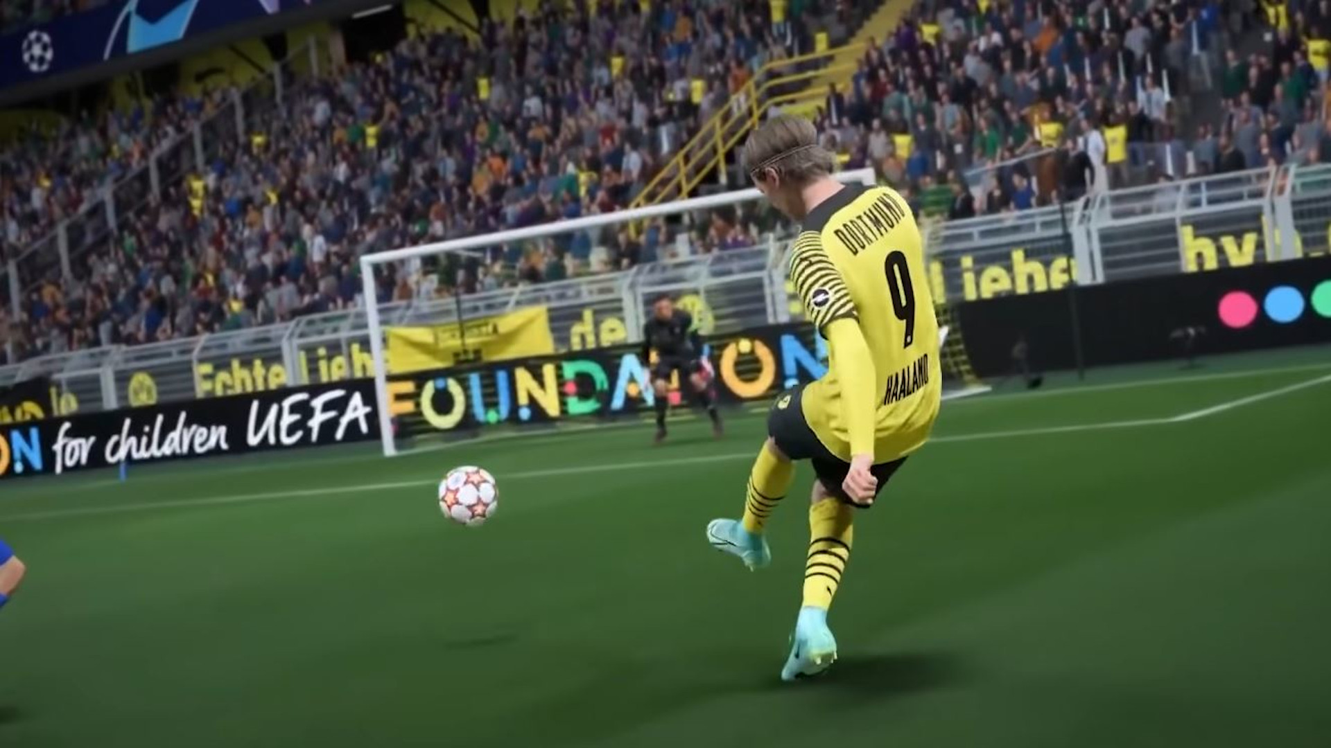 FIFA 22 best striker: A player in a yellow jersey kicking the ball towards the opponent's goal.