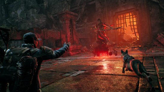 Remnant 2 preview: A player points at a glowing red boss, instructing their dog companion to rush towards it