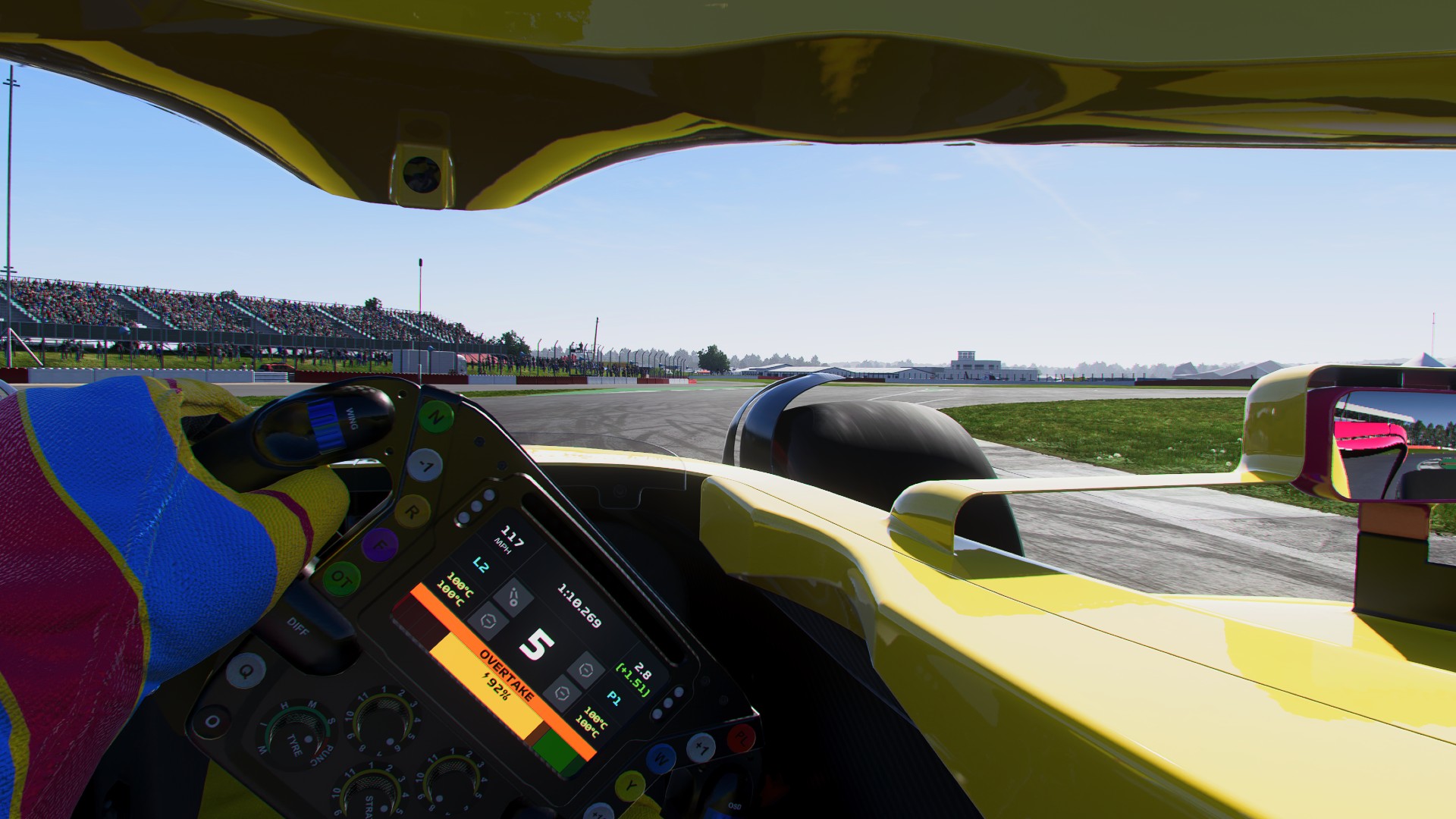 https://www.theloadout.com/wp-content/sites/theloadout/2023/06/f1-23-review-cockpit-silverstone.jpg