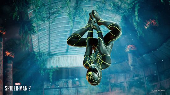 Spider-Man 2 suits: Peter hangs upside down wearing a black and bright green suit