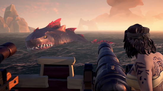 Best open-world games: a pirate aiming a cannon at the megalodon in Sea of Thieves