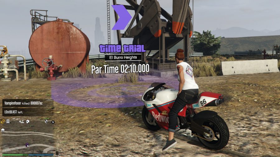A woman riding a moto GP bike in front of a time trial task in GTA 5 Online
